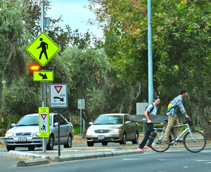 Rectangular Rapid Flashing Beacon example from Davis, CA. Photo by Lara Justine via Flickr